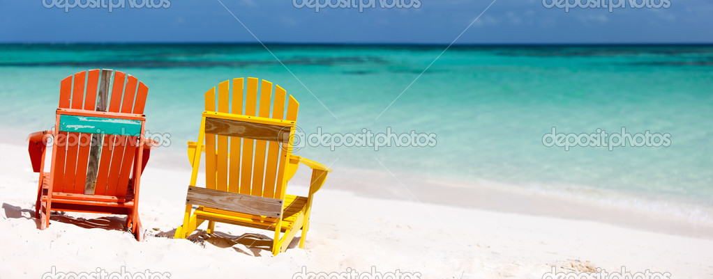 Colorful lounge chairs at Caribbean beach