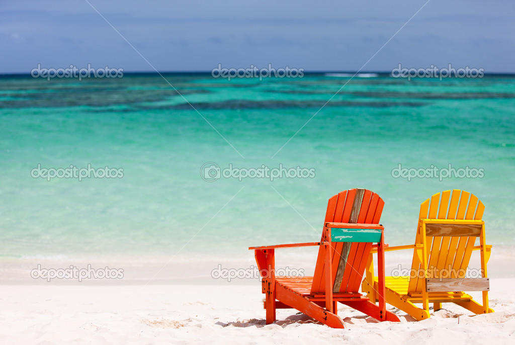 Colorful lounge chairs at Caribbean beach