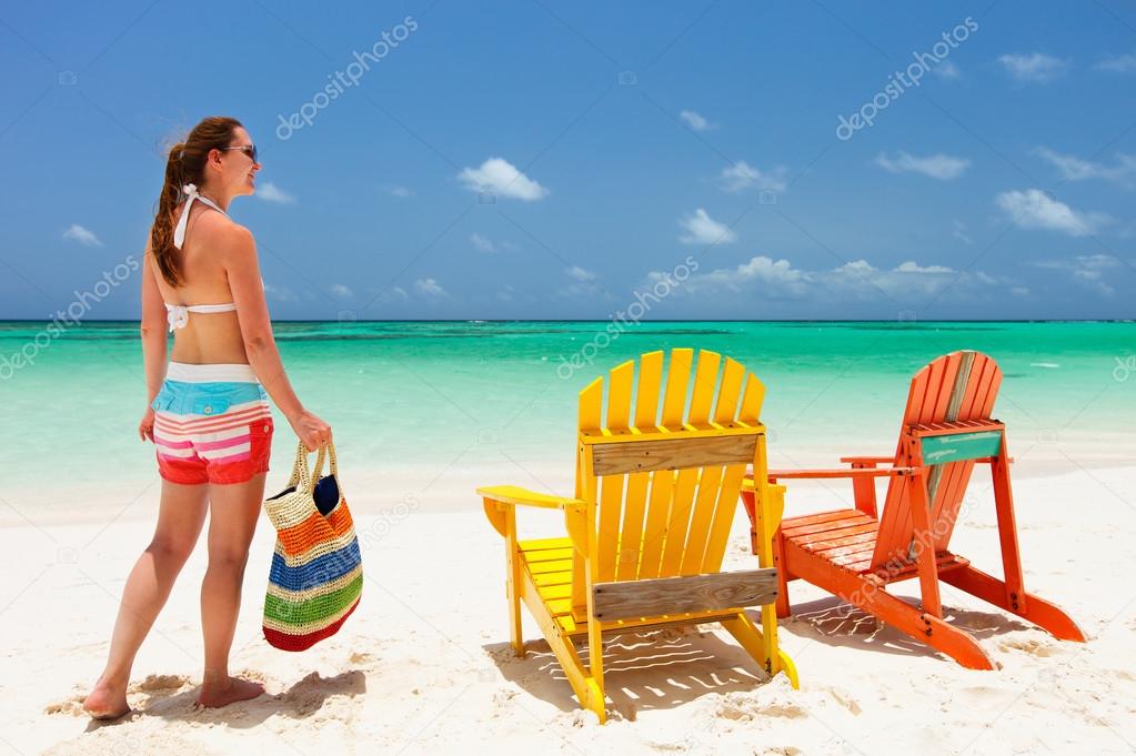 Young woman on beach vacation