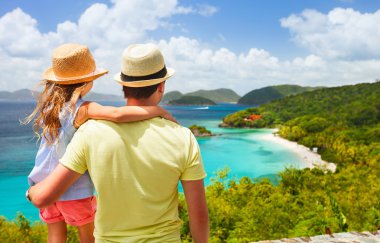 Family at Trunk bay on St John island clipart