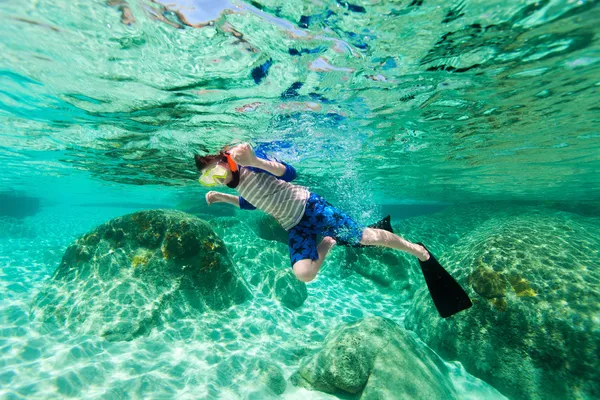 Boy swimming underwater — Stock Photo, Image