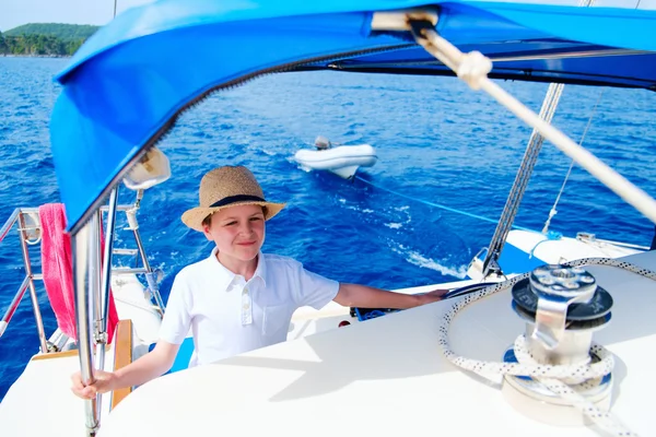 Teenage boy at luxury yacht — Stock Photo, Image