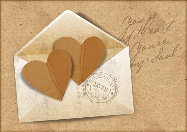 Vintage background with envelope and hearts — Stock Photo, Image