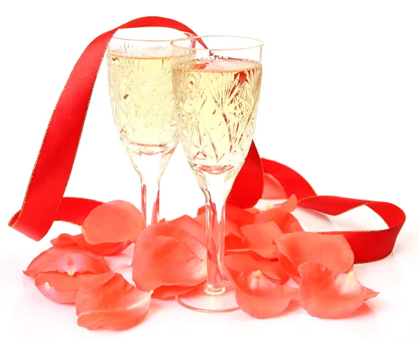 Wine and petals of roses — Stock Photo, Image