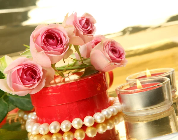 Pink roses and candles — Stock Photo, Image