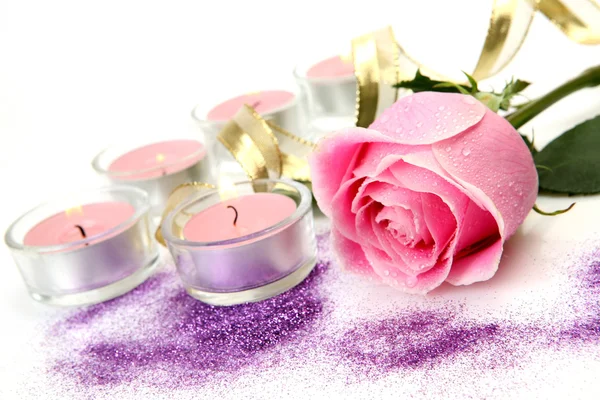 Pink rose and candle — Stock Photo, Image