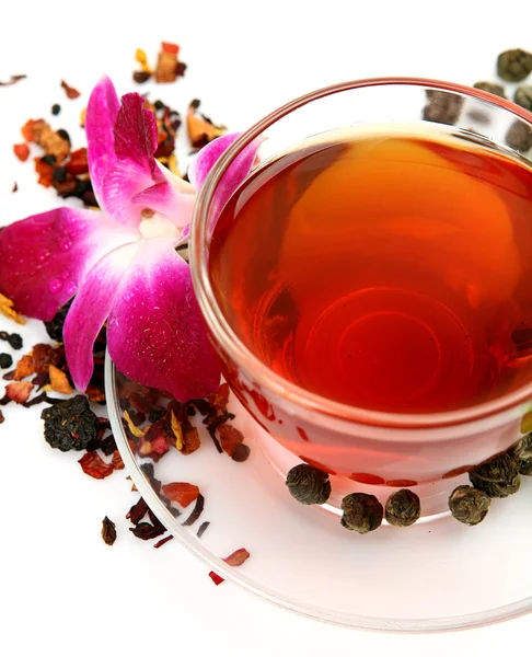 Tea and pink orchid — Stock Photo, Image