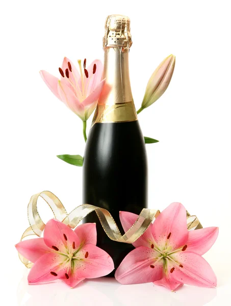 Champagne and pink lilies — Stock Photo, Image