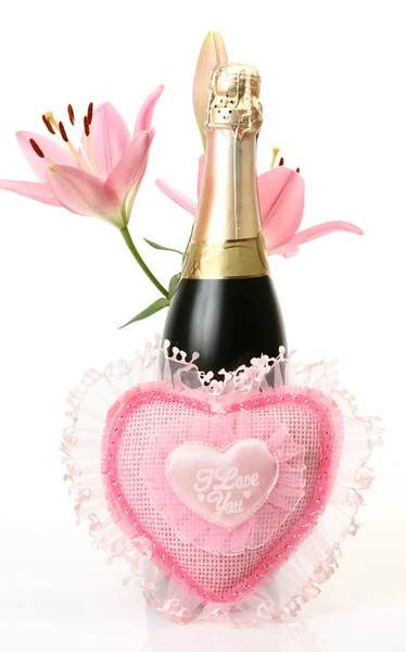 Champagne and pink lilies Stock Picture
