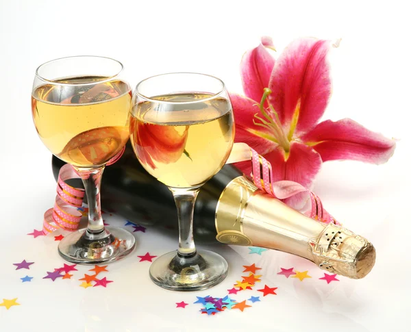 Wine and pink lilies — Stock Photo, Image