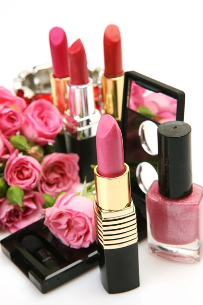 Decorative cosmetics and roses — Stock Photo, Image