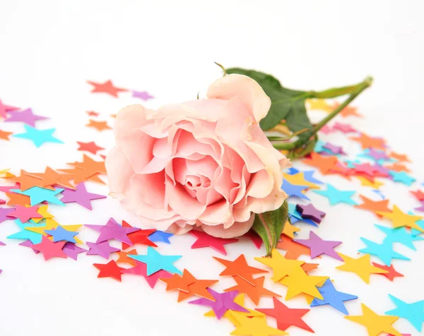 Rose and confetti — Stock Photo, Image