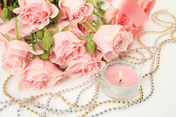 Fine roses and candle — Stock Photo, Image