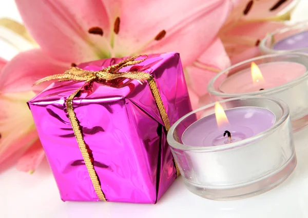 Pink lilies and gifts — Stock Photo, Image