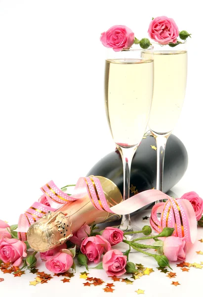 Шампанське і рожеві троянди — стокове фото