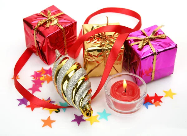 New Year's ornaments and candles — Stock Photo, Image