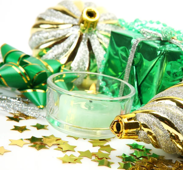 New Year's ornaments and candles — Stock Photo, Image