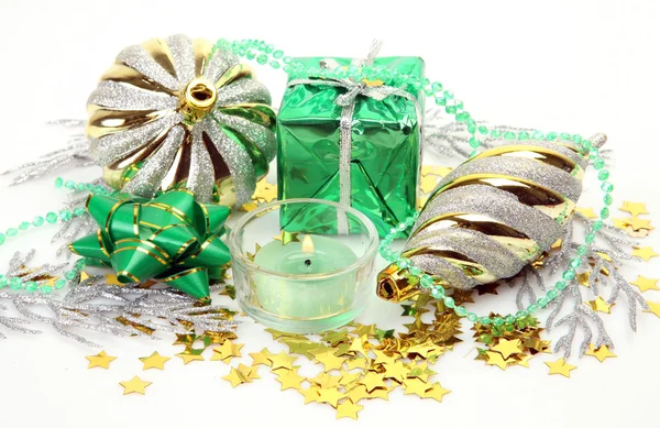 New Year's ornaments and candles — Stock Photo, Image