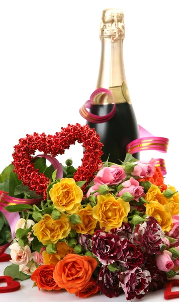 Champagne and bouquet of roses Stock Picture