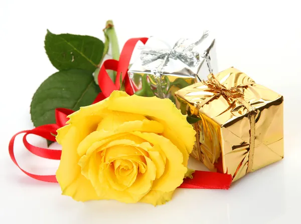 Yellow rose and gifts Stock Picture