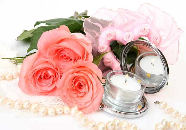 Růžové růže a svíčky — Stock fotografie