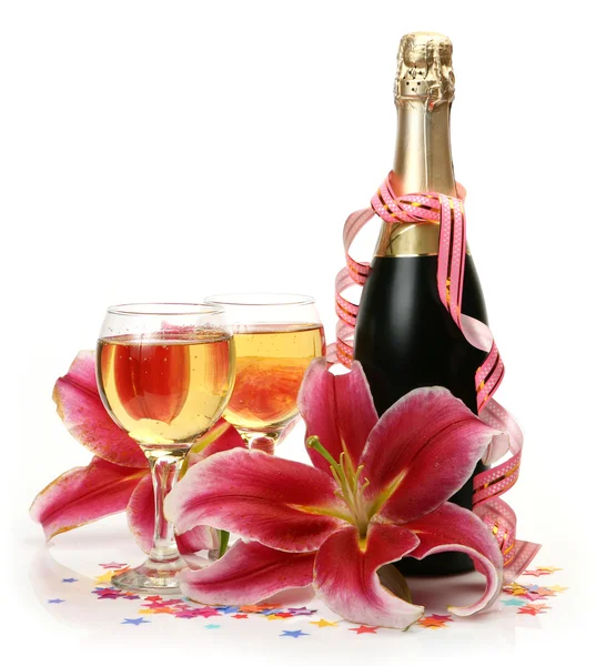 Champagne and pink lilies — Stock Photo, Image