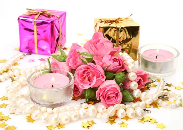 Bouquet of roses and candles — Stock Photo, Image