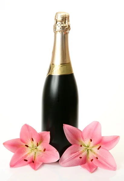 Champagne och blommor — Stockfoto