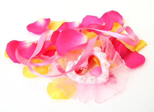 Bloemblaadjes van een roze roos — Stockfoto