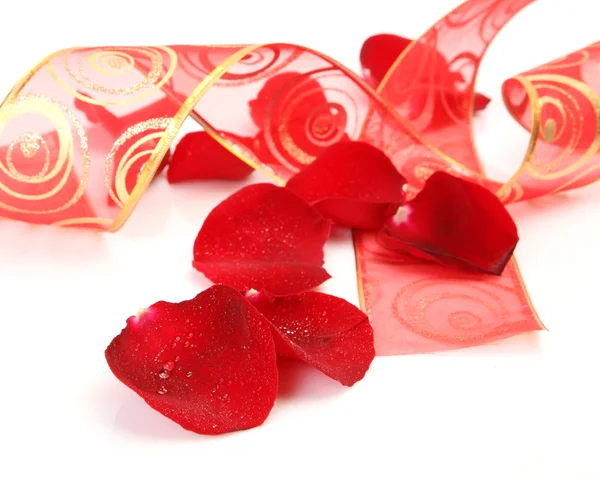 Petals of roses and tape — Stock Photo, Image