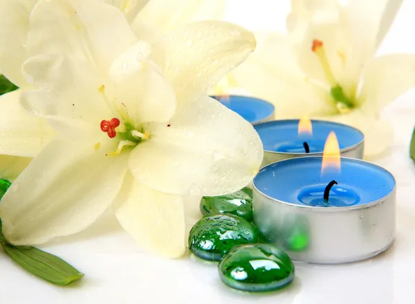 Fine lilies and candles — Stock Photo, Image