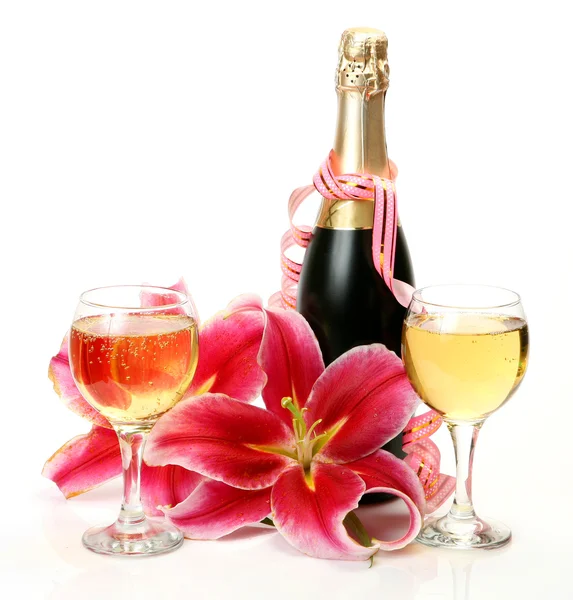 Wine and pink lily — Stock Photo, Image