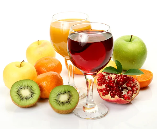 Ripe fruits and juice — Stock Photo, Image