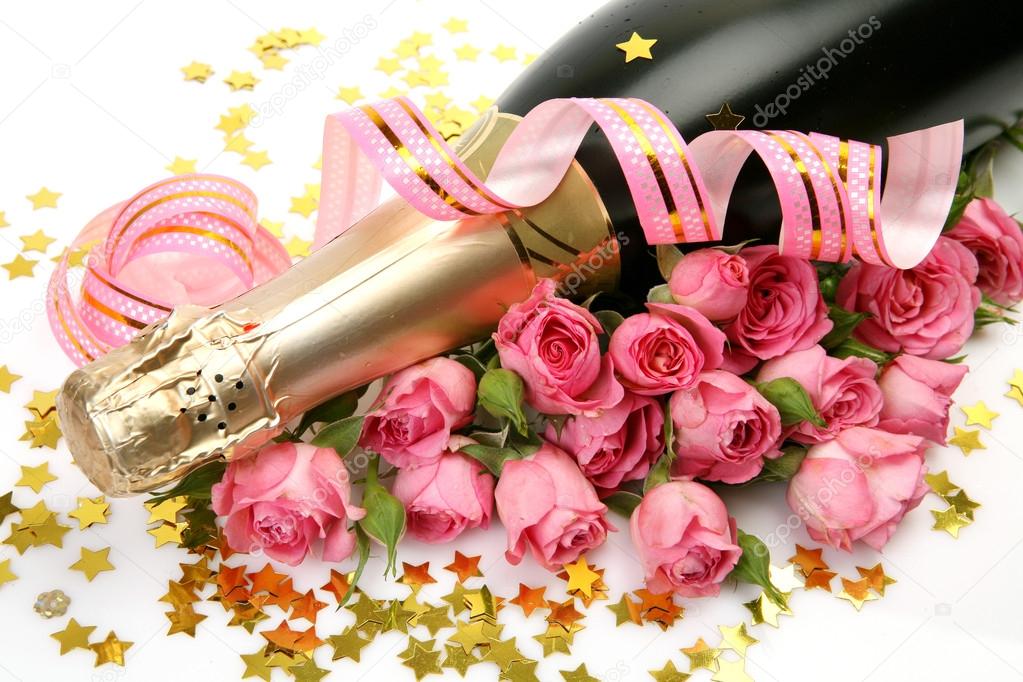 Champagne and pink roses — Stock Photo © Elena777 35579633