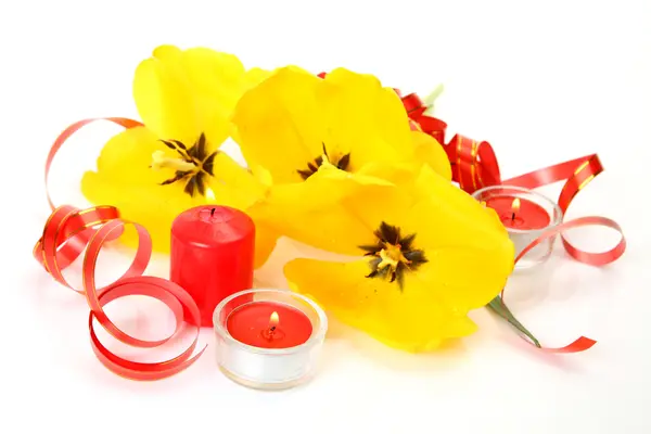 Yellow tulip and candles — Stock Photo, Image