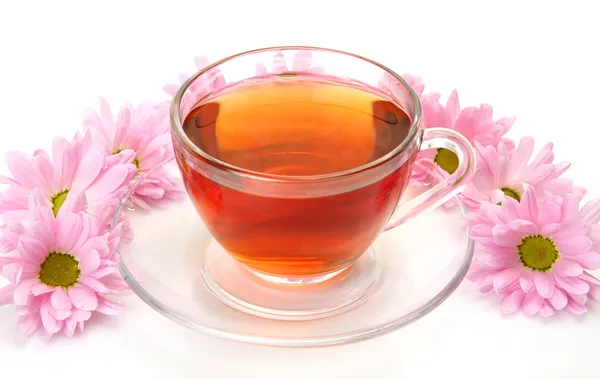 Tea and pink flowers — Stock Photo, Image