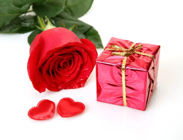 Fine rose and gift — Stock Photo, Image