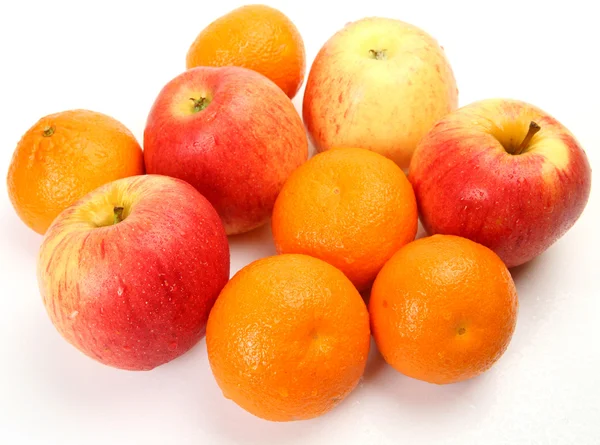 Ripe tangerines and apple — Stock Photo, Image