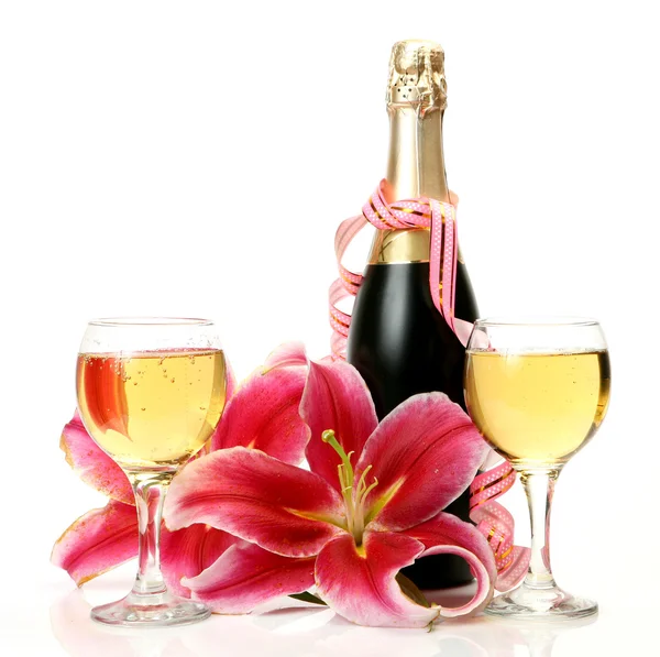 Champagne and pink lily — Stock Photo, Image