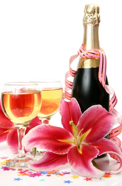 Champagne and pink lily — Stock Photo, Image