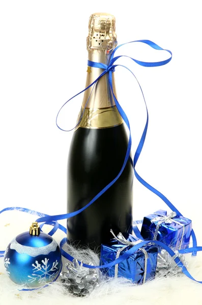 Champagne and New Year's ornaments — Stock Photo, Image
