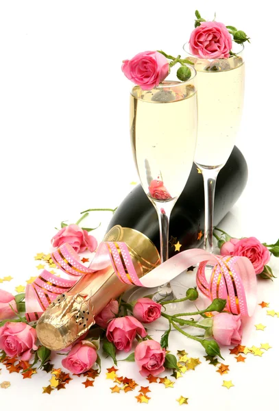 Champagne and pink roses — Stock Photo, Image