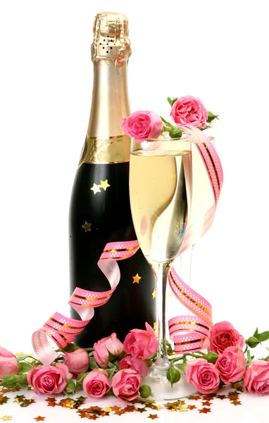 Champagner und rosa Rosen — Stockfoto