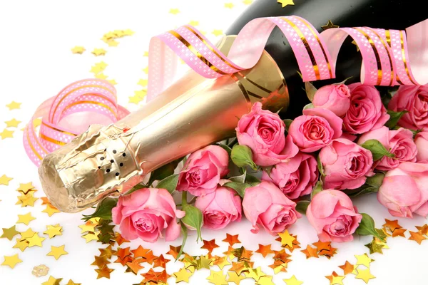 Champagne en roze rozen — Stockfoto