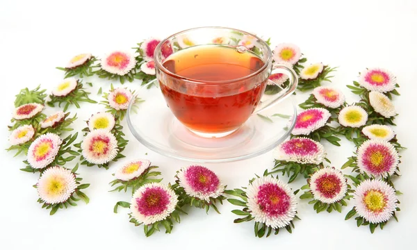 Te og blomster – stockfoto