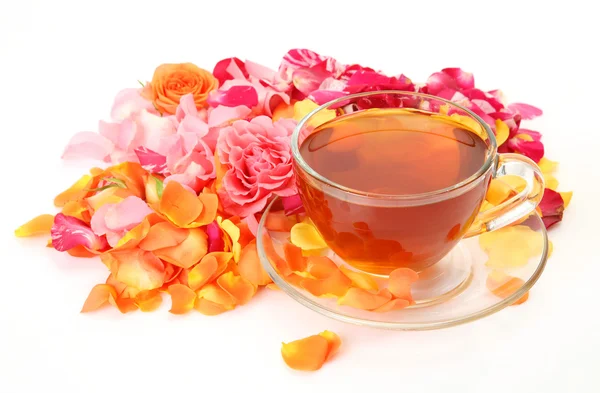 Tea and petals of roses — Stock Photo, Image