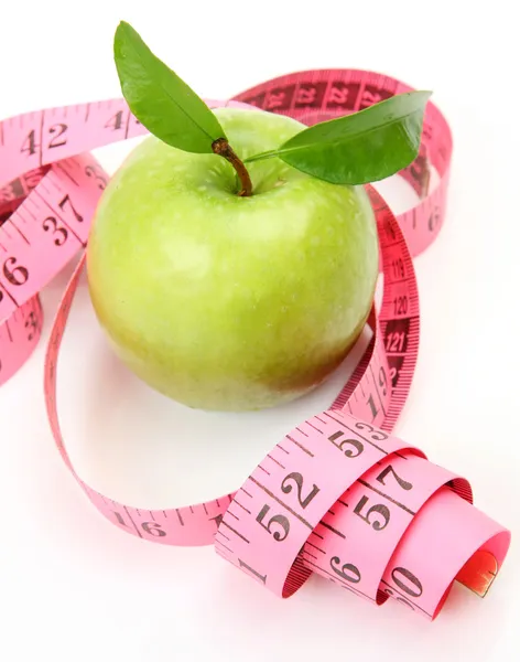 Green apple and measuring tape — Stock Photo, Image