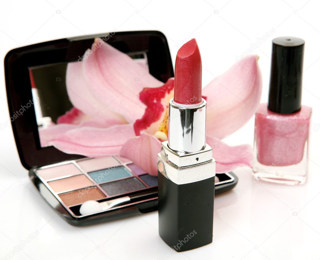 Decorative cosmetics and pink orchid