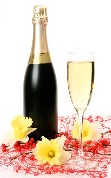 Шампанское и цветы — стоковое фото