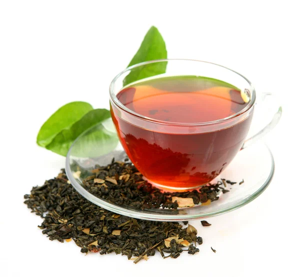 Cup with tea and a leaf — Stock Photo, Image